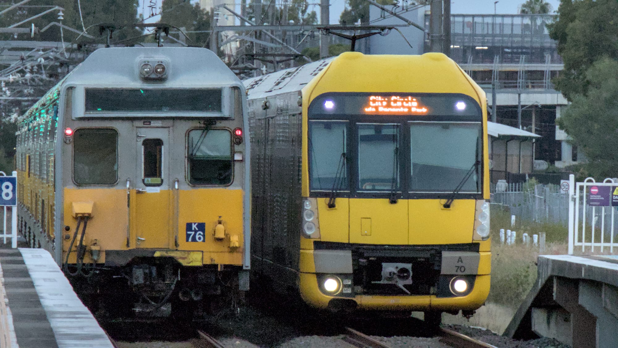 Silver K set next to a modern yellow-fronted A set on the right, with ditch lights on